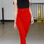 Phoebe Dynevor in a Red Dress Arrives for a Taping of The Drew Barrymore Show in New York