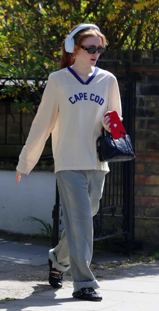 Sadie Sink in a Grey Jeans