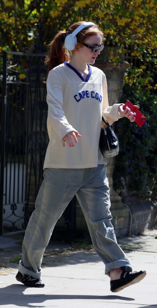 Sadie Sink in a Grey Jeans
