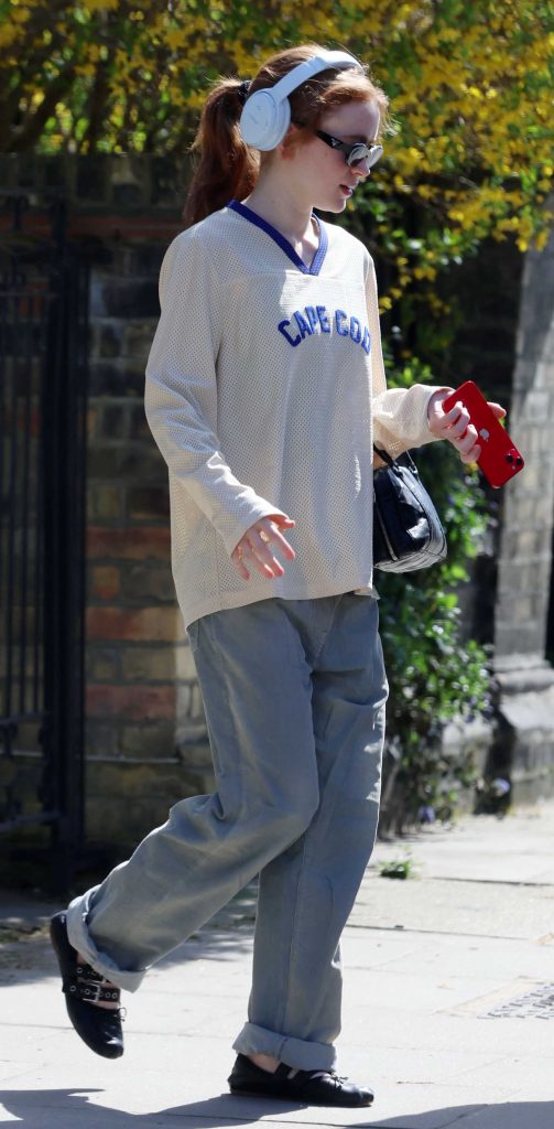 Sadie Sink in a Grey Jeans