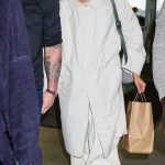 Zendaya in a Beige Trench Coat Catches a Departing Flight at JFK International Airport in New York City