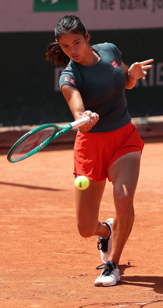 Emma Raducanu in a Red Shorts