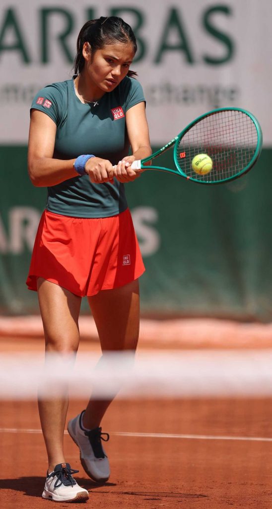 Emma Raducanu in a Red Shorts