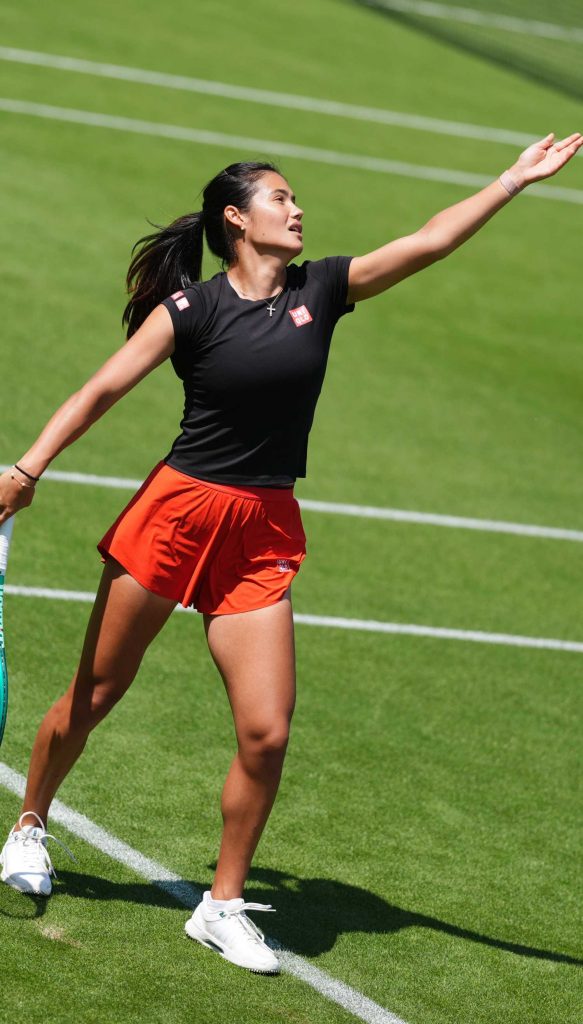 Emma Raducanu in a Red Shorts