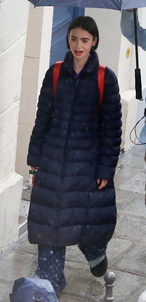 Lily Collins in a Black Puffer Coat