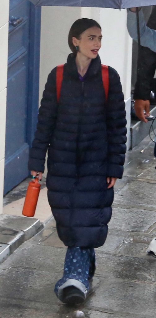 Lily Collins in a Black Puffer Coat