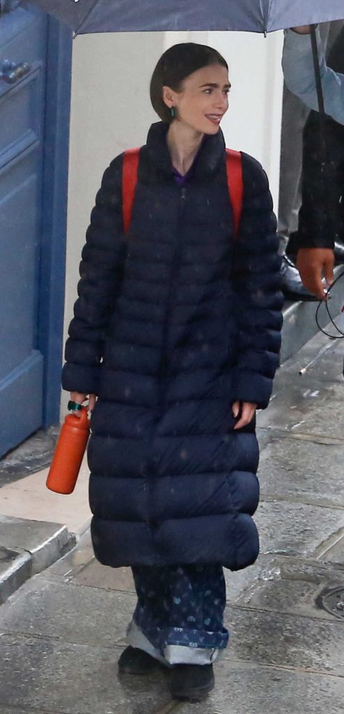 Lily Collins in a Black Puffer Coat