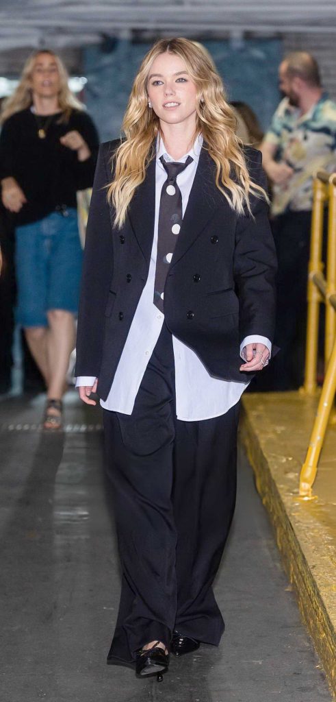 Milly Alcock in a Black Pantsuit