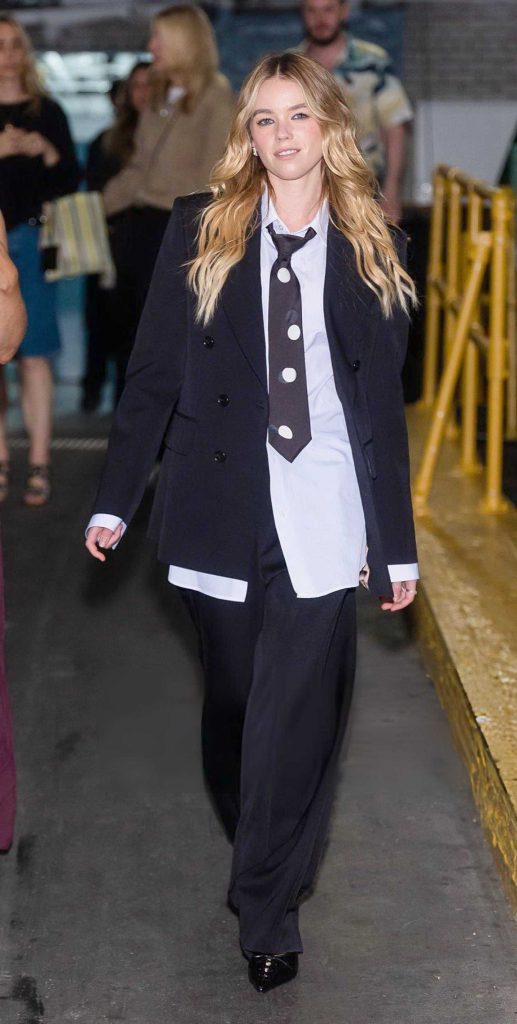 Milly Alcock in a Black Pantsuit