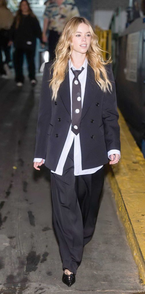 Milly Alcock in a Black Pantsuit