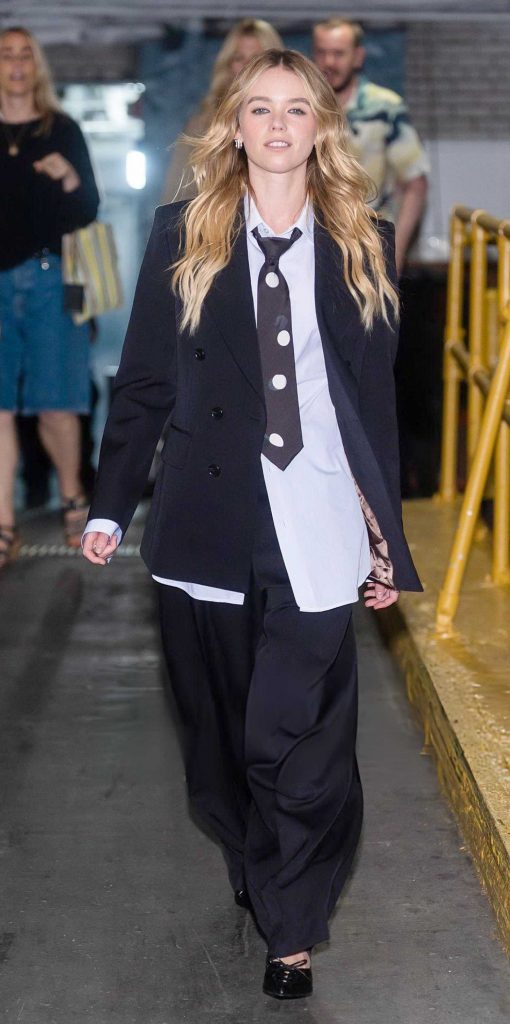 Milly Alcock in a Black Pantsuit