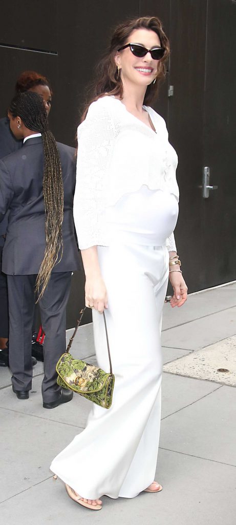 Anne Hathaway in a White Ensemble