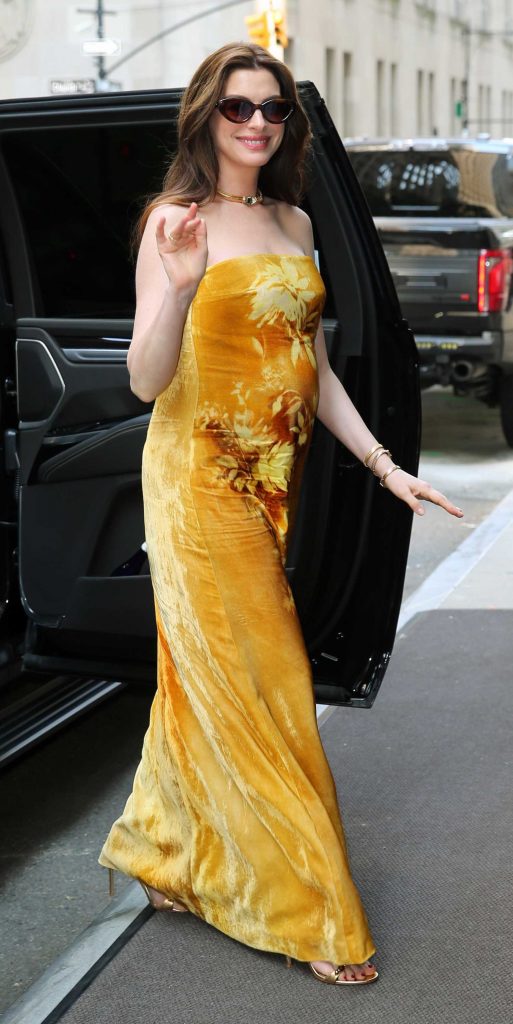 Anne Hathaway in an Orange Dress