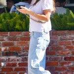 Mila Kunis in a Blue Jeans Shopping at The Challah Shoppe in Beverly Hills