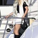 Sydney Sweeney in a White Shorts Arrives at a Small Harbour in Palma