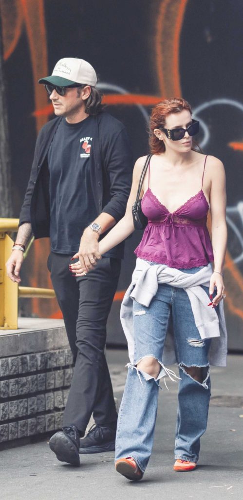 Bella Thorne in a Purple Top