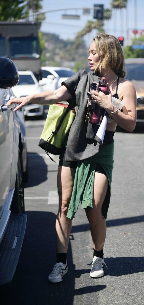 Hilary Duff in a Black Spandex Shorts