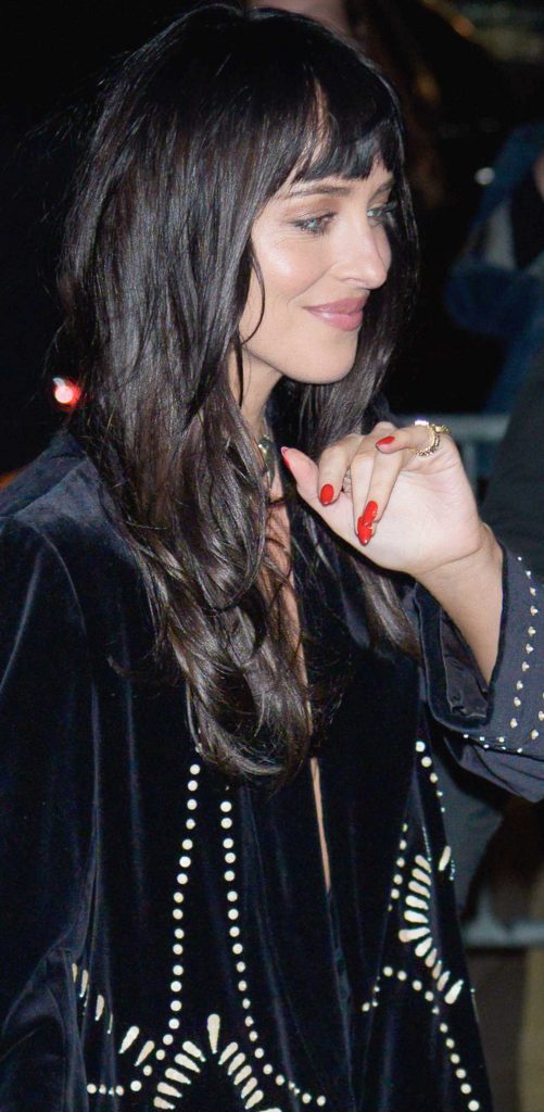 Dakota Johnson in a Black Coat