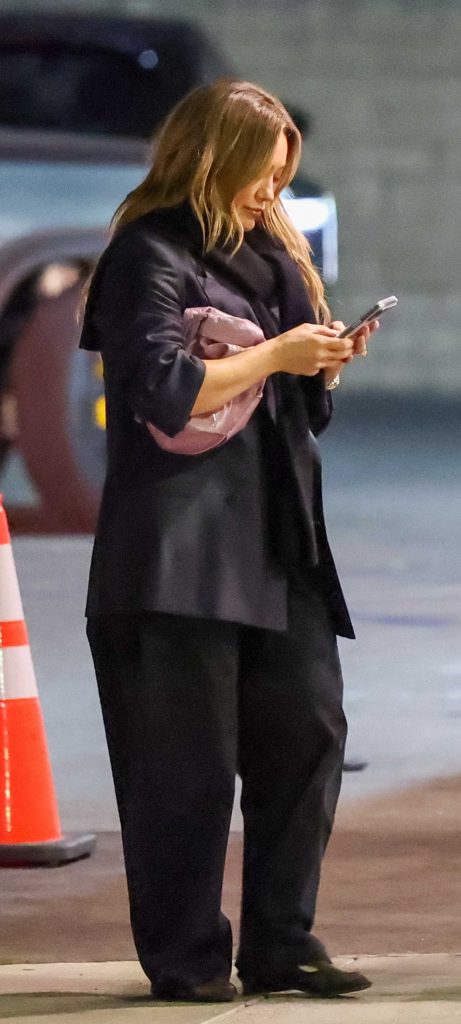 Hilary Duff in a Black Pantsuit