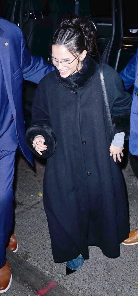 Inde Navarrette in a Black Coat