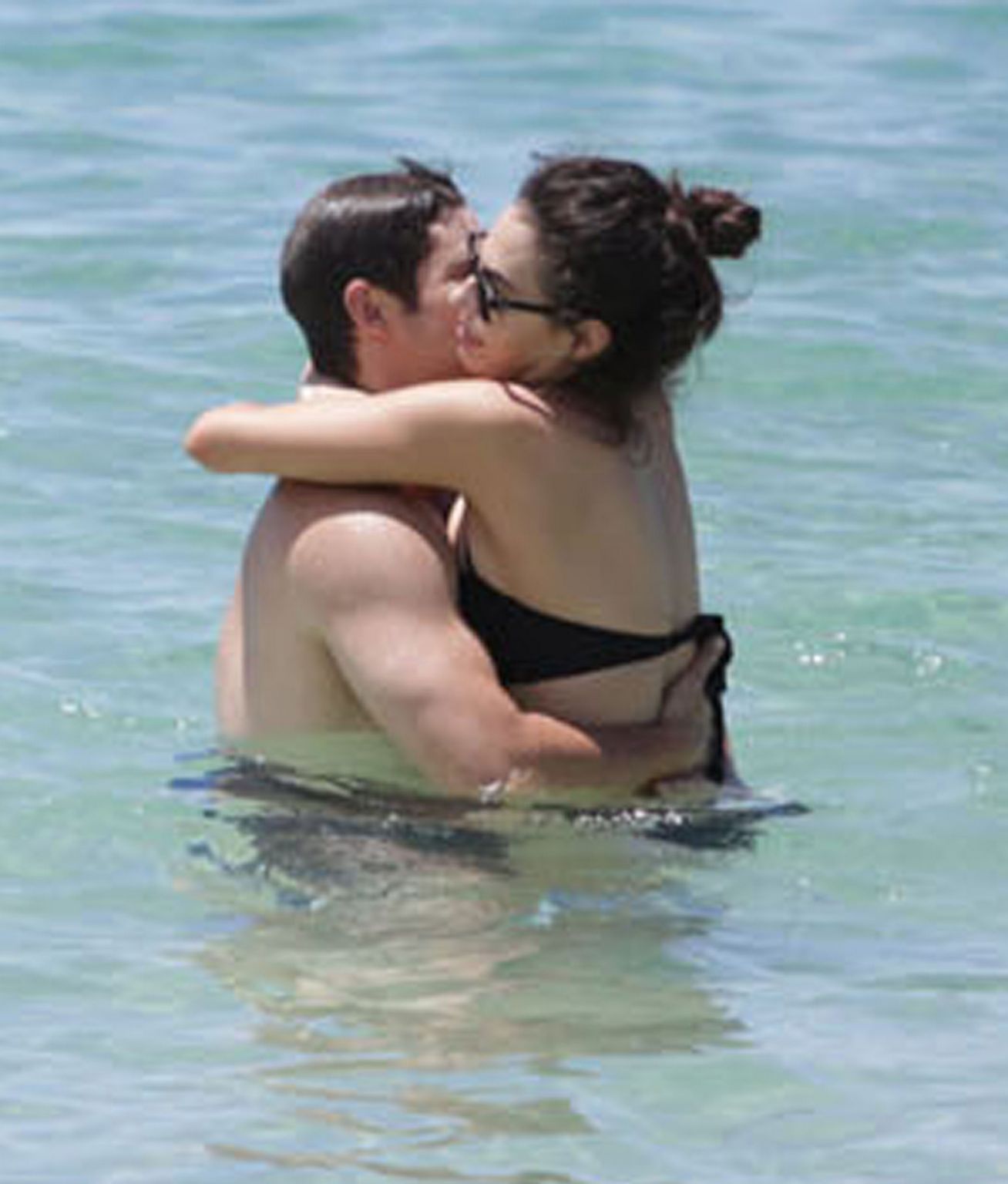 Adam DeVine and Chloe Bridges Enjoy A Day On The Beach