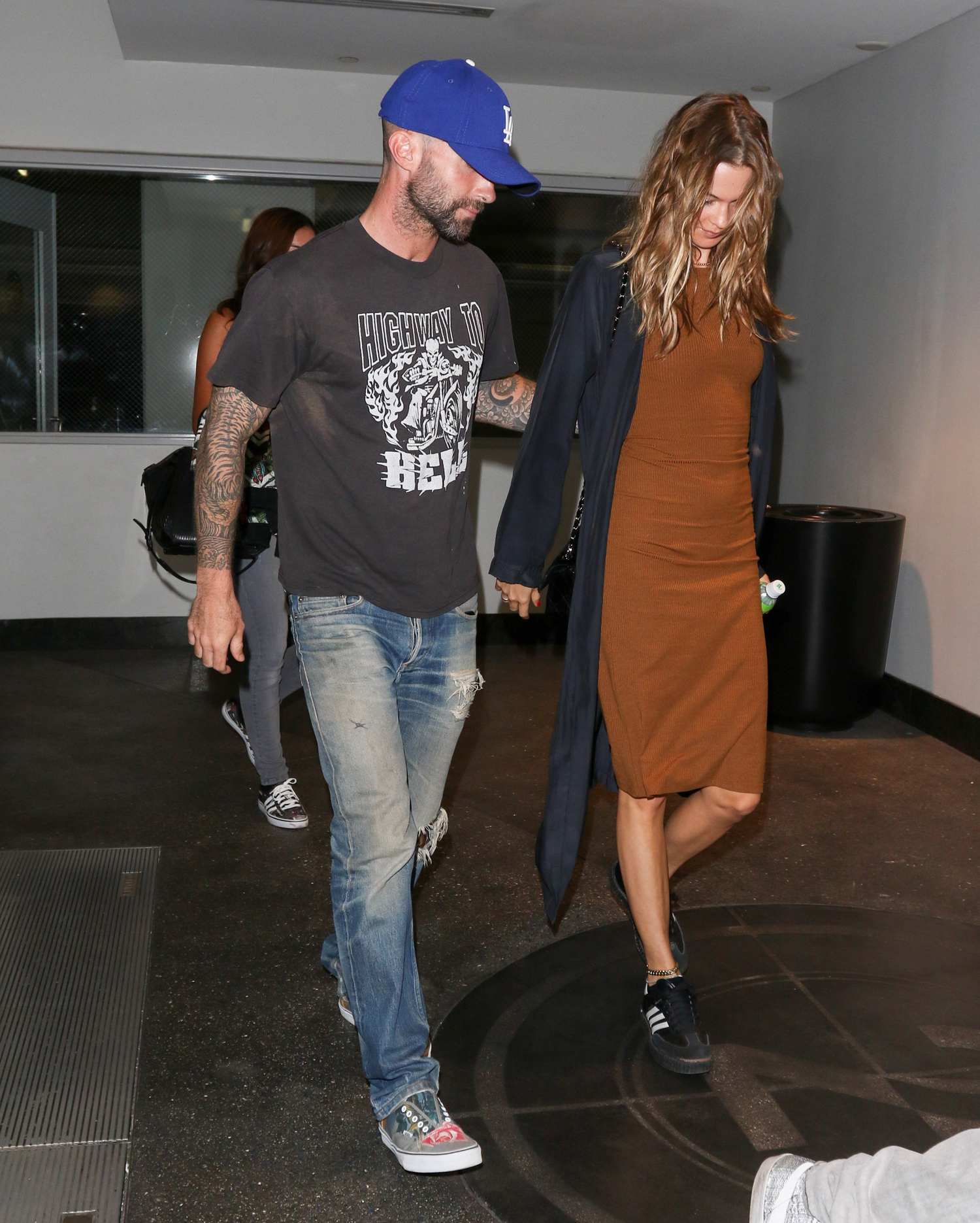 Adam Levine and Behati Prinsloo Arrive at LAX Airport