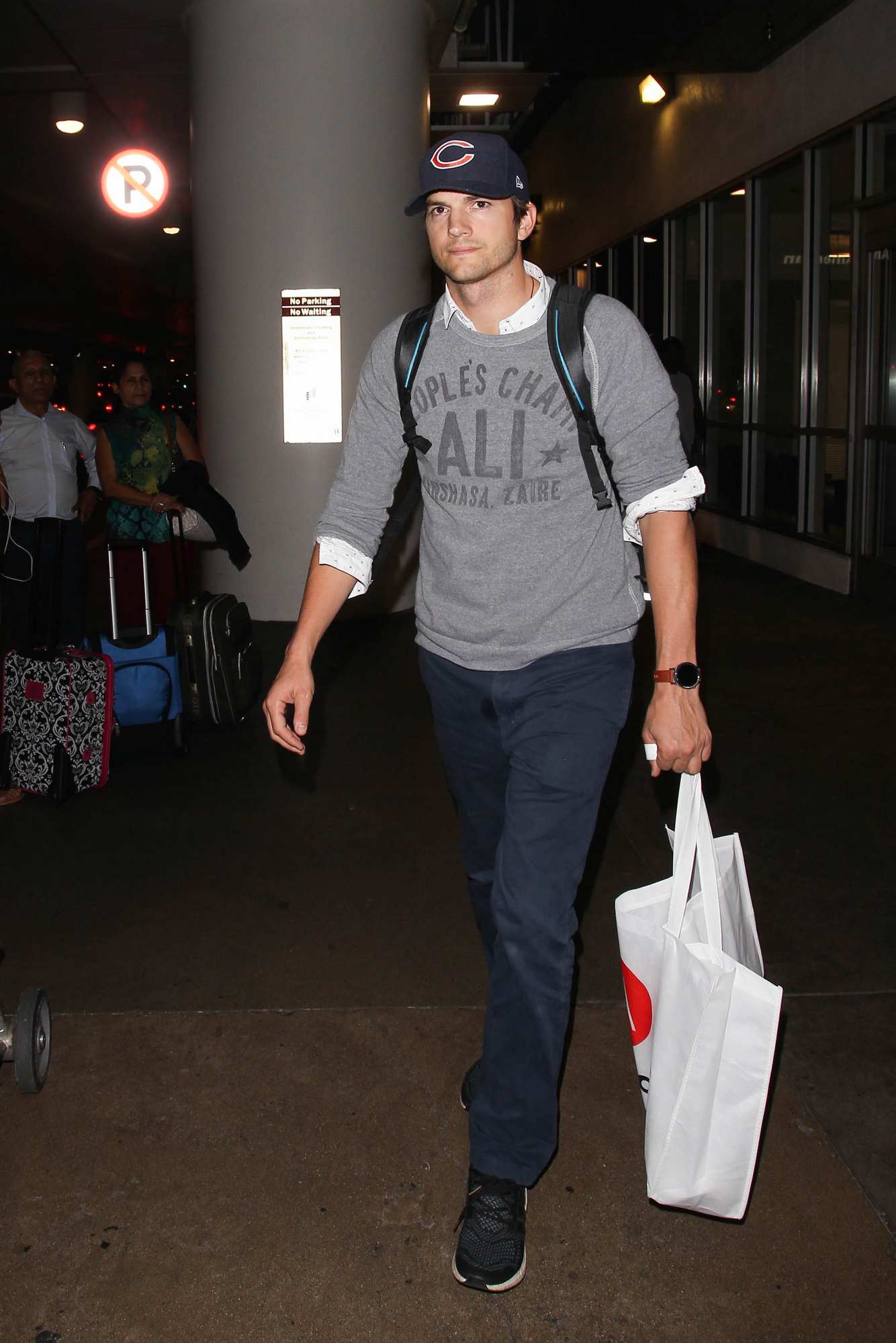 Ashton Kutcher Arrives at LAX Airport