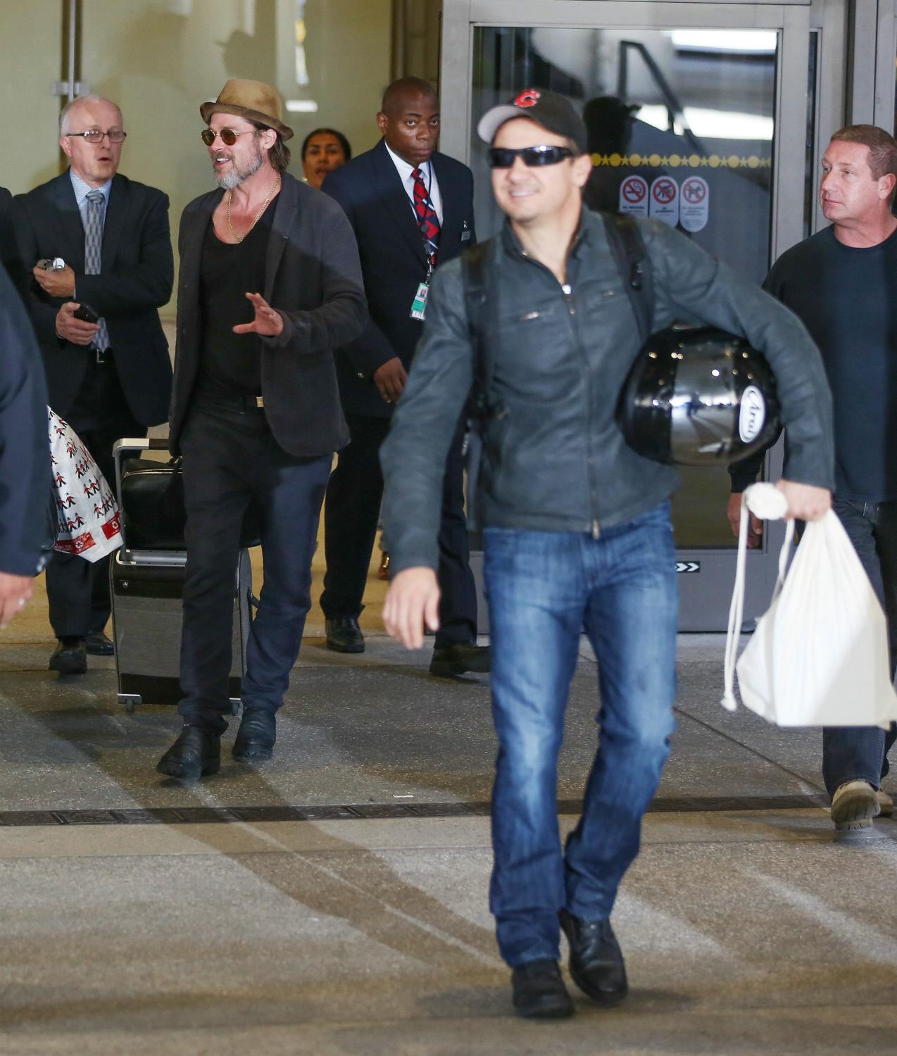 Brad Pitt and Jeremy Renner Arrives at LAX Airport