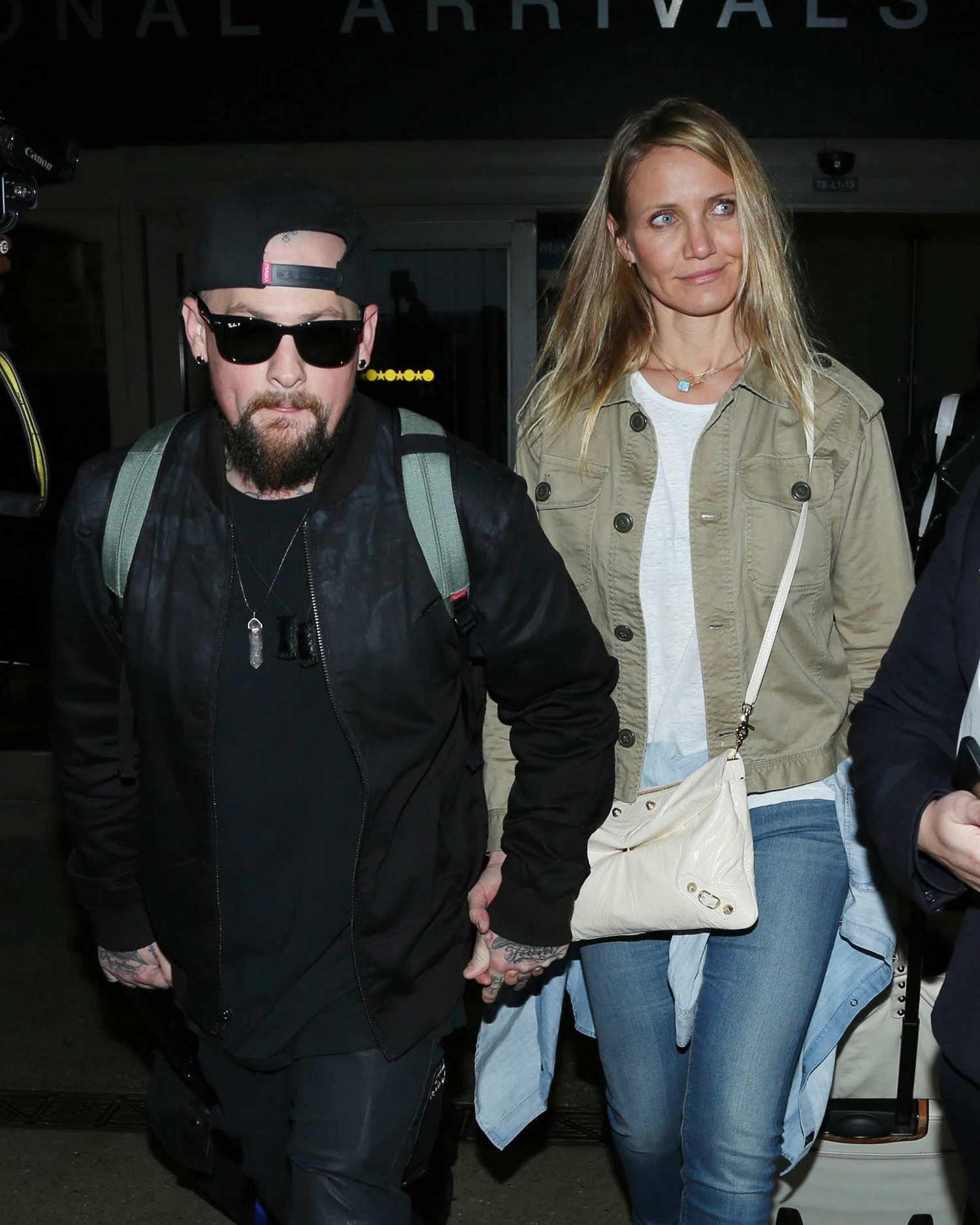 Cameron Diaz and Husband Benji Madden Arrive at LAX Airport