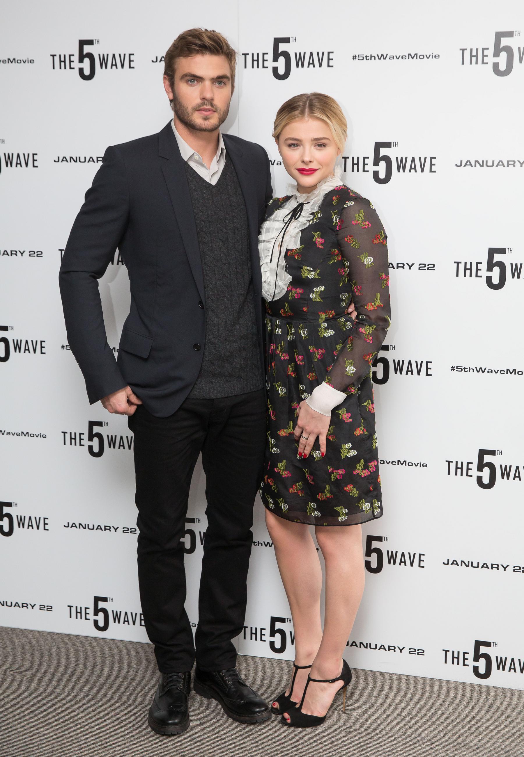 Chloe Moretz and Alex Roe at The Fifth Wave Photocall Jan Celeb Donut