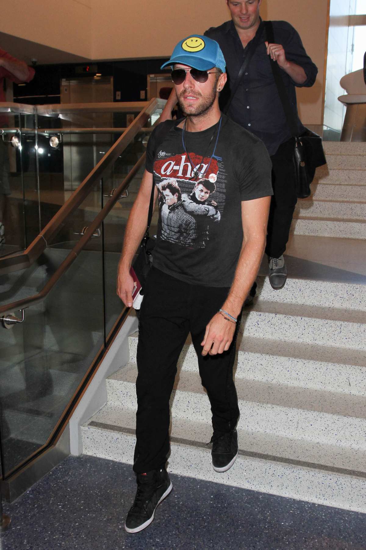 Chris Martin Arrives at LAX Airport