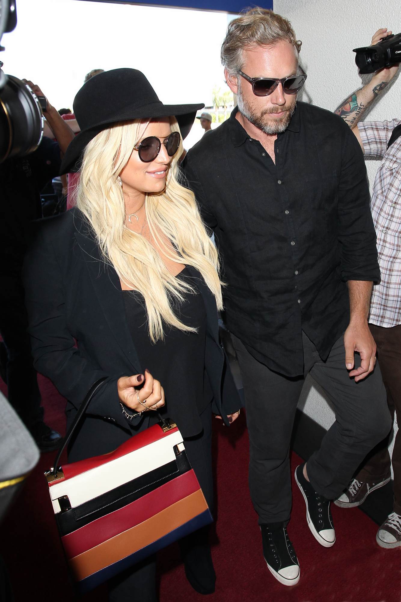 Jessica Simpson and Eric Johnson Arrive at LAX Airport