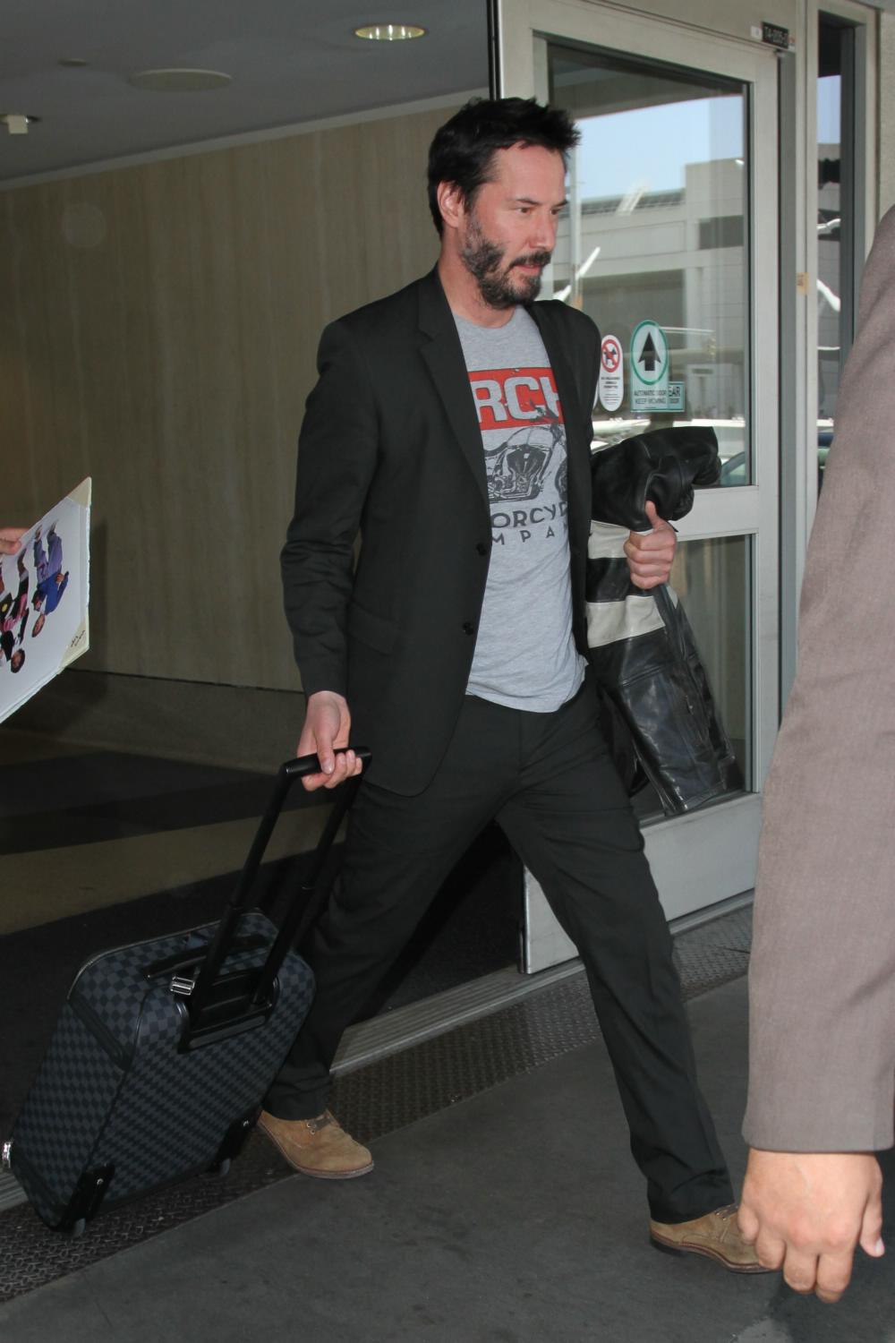 Keanu Reeves is seen at LAX Airport