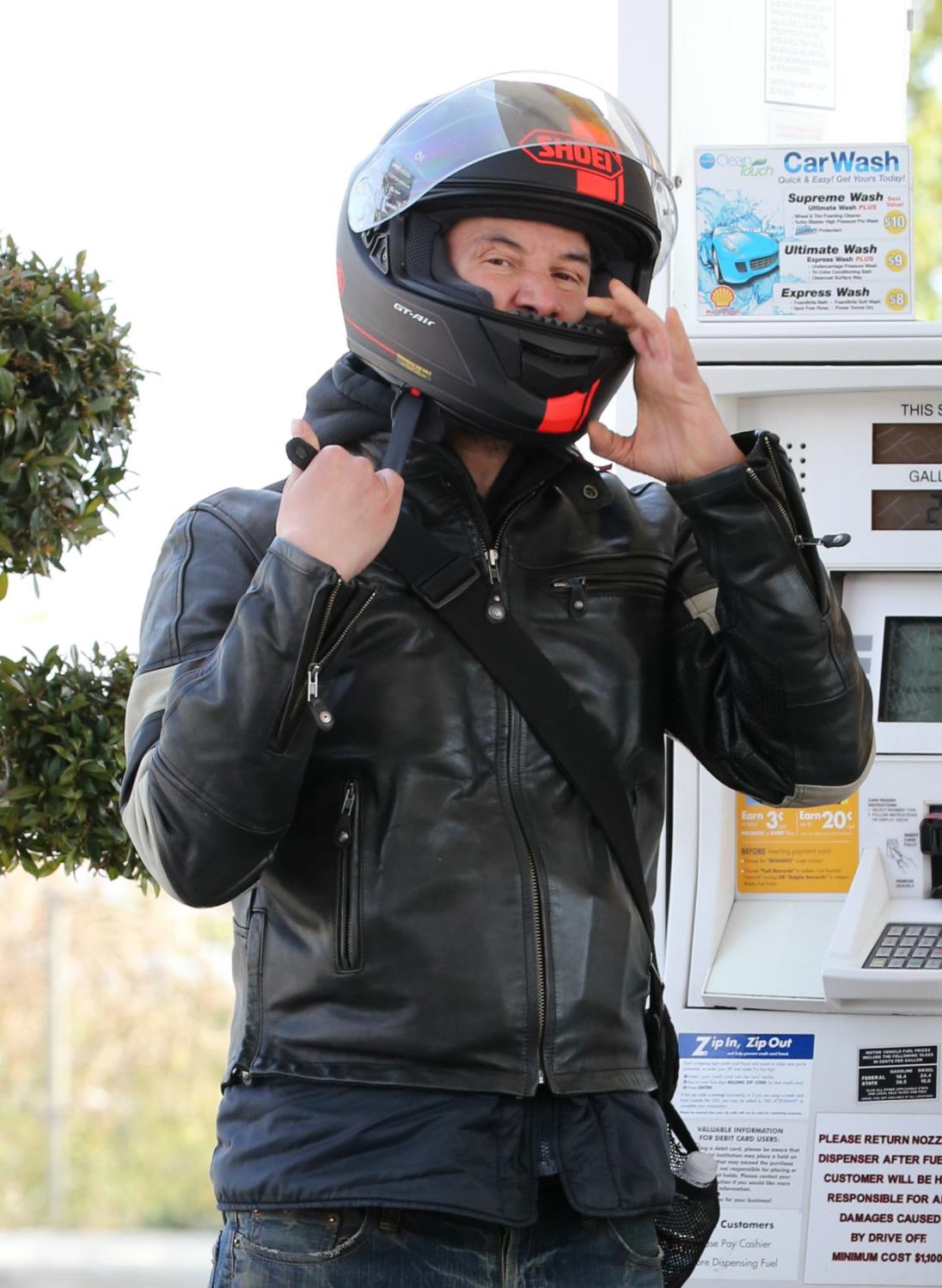 Keanu Reeves Takes His Bike To Gas Pump