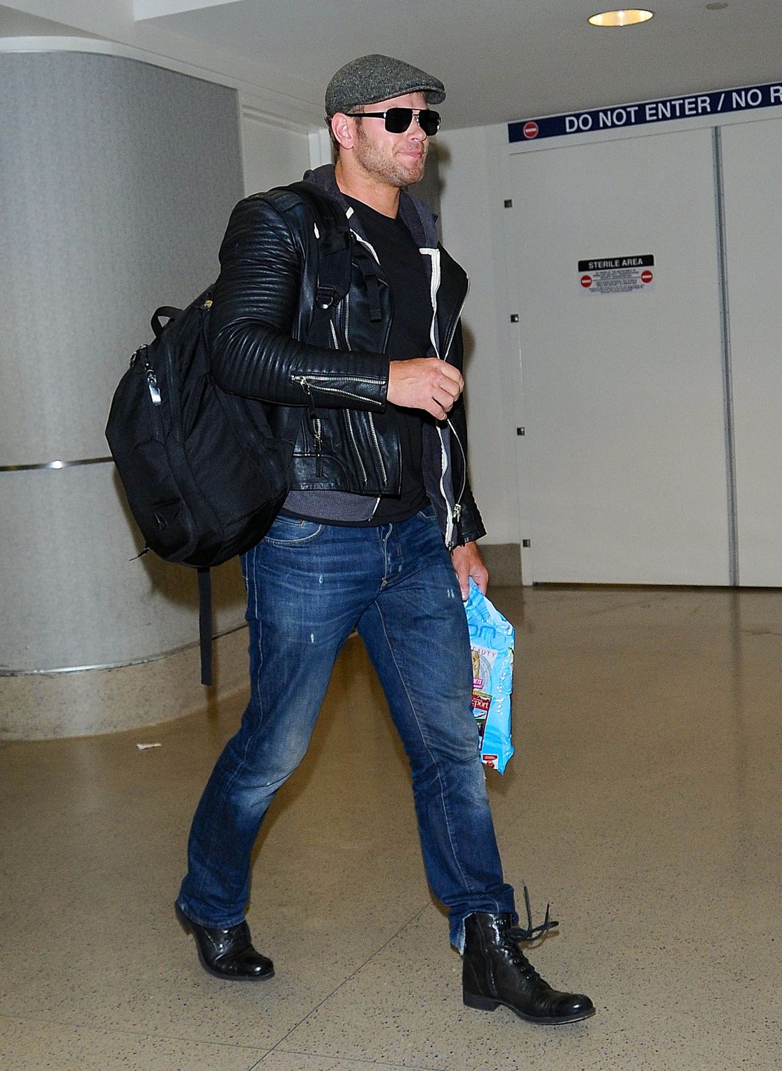 Kellan Lutz Arrives at LAX Airport