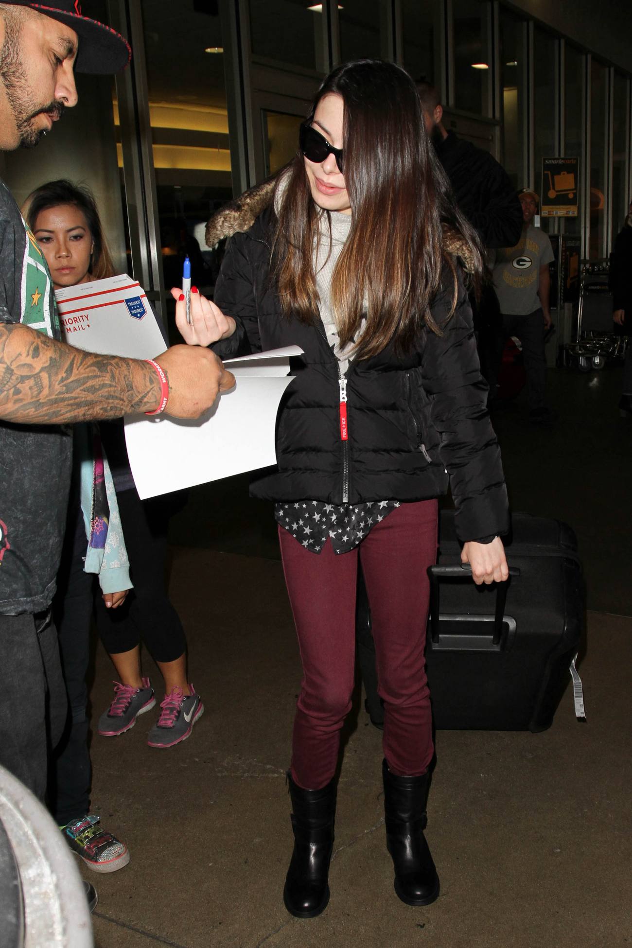Miranda Cosgrove Arrives at LAX Airport