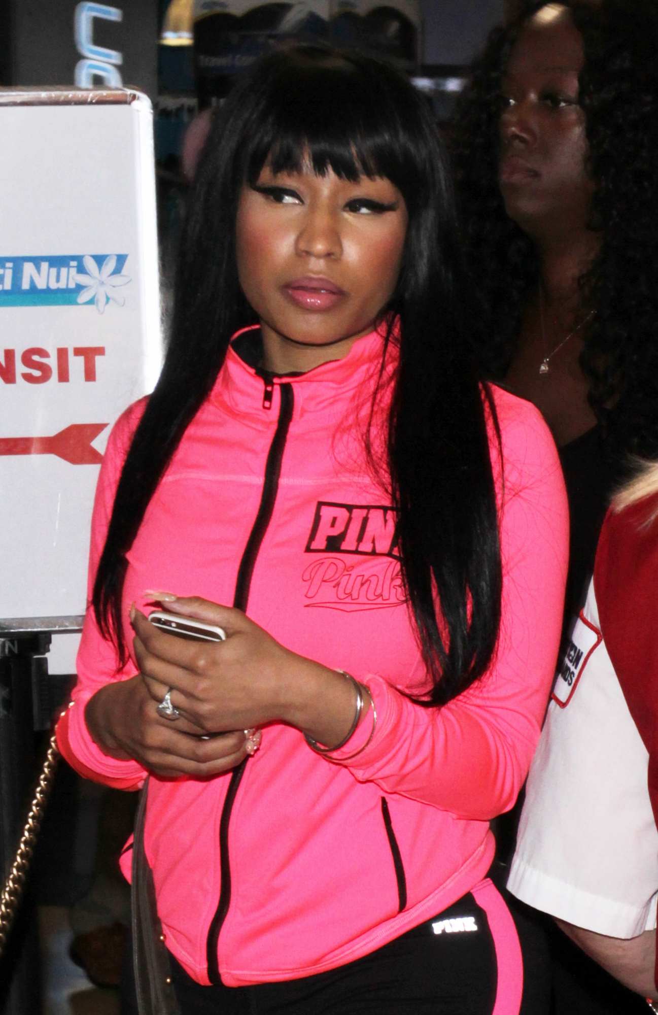 Nicki Minaj Seen in Hot Pink Track Arrives at LAX Airport