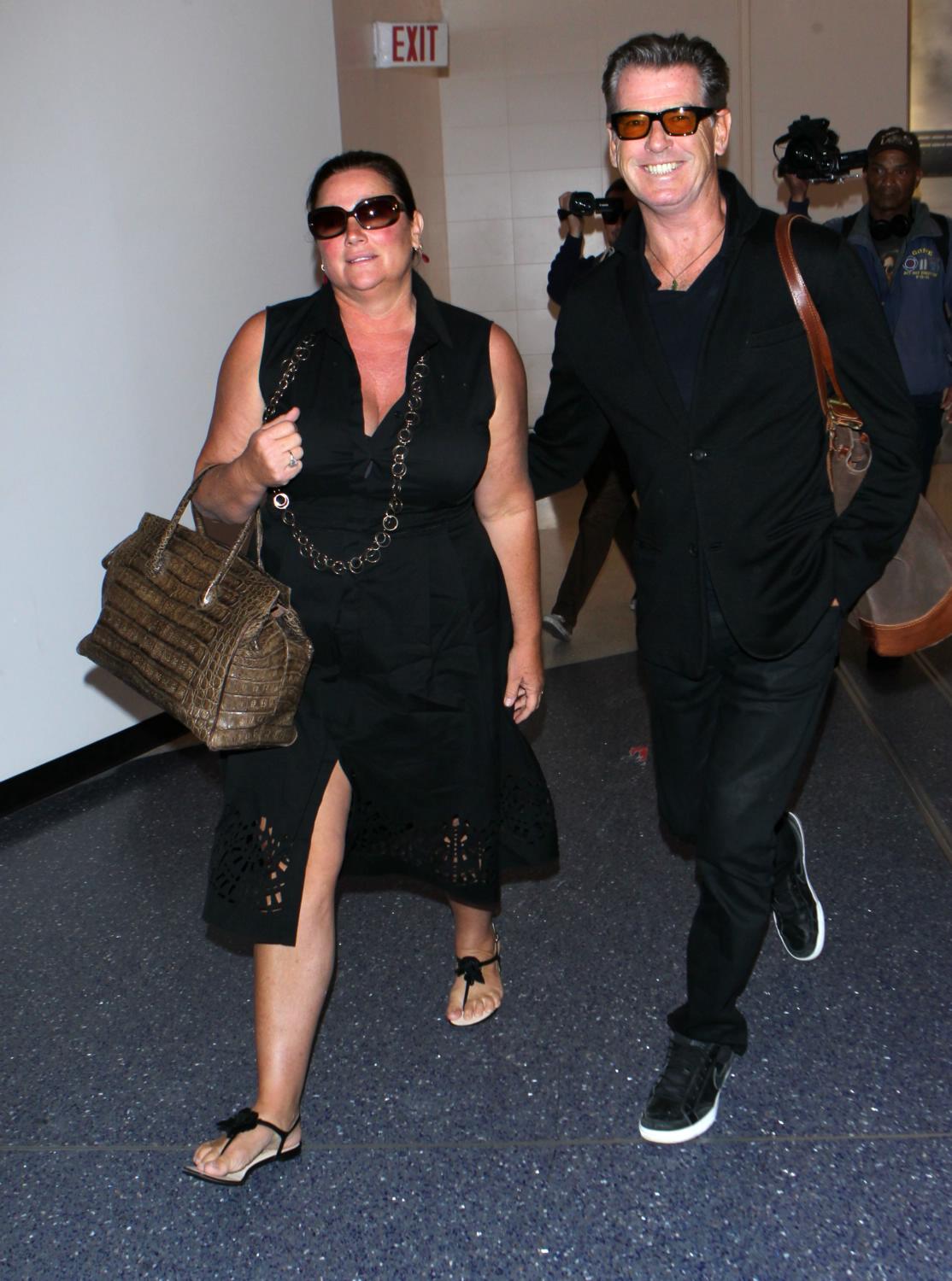 Pierce Brosnan and his wife Leaving LA