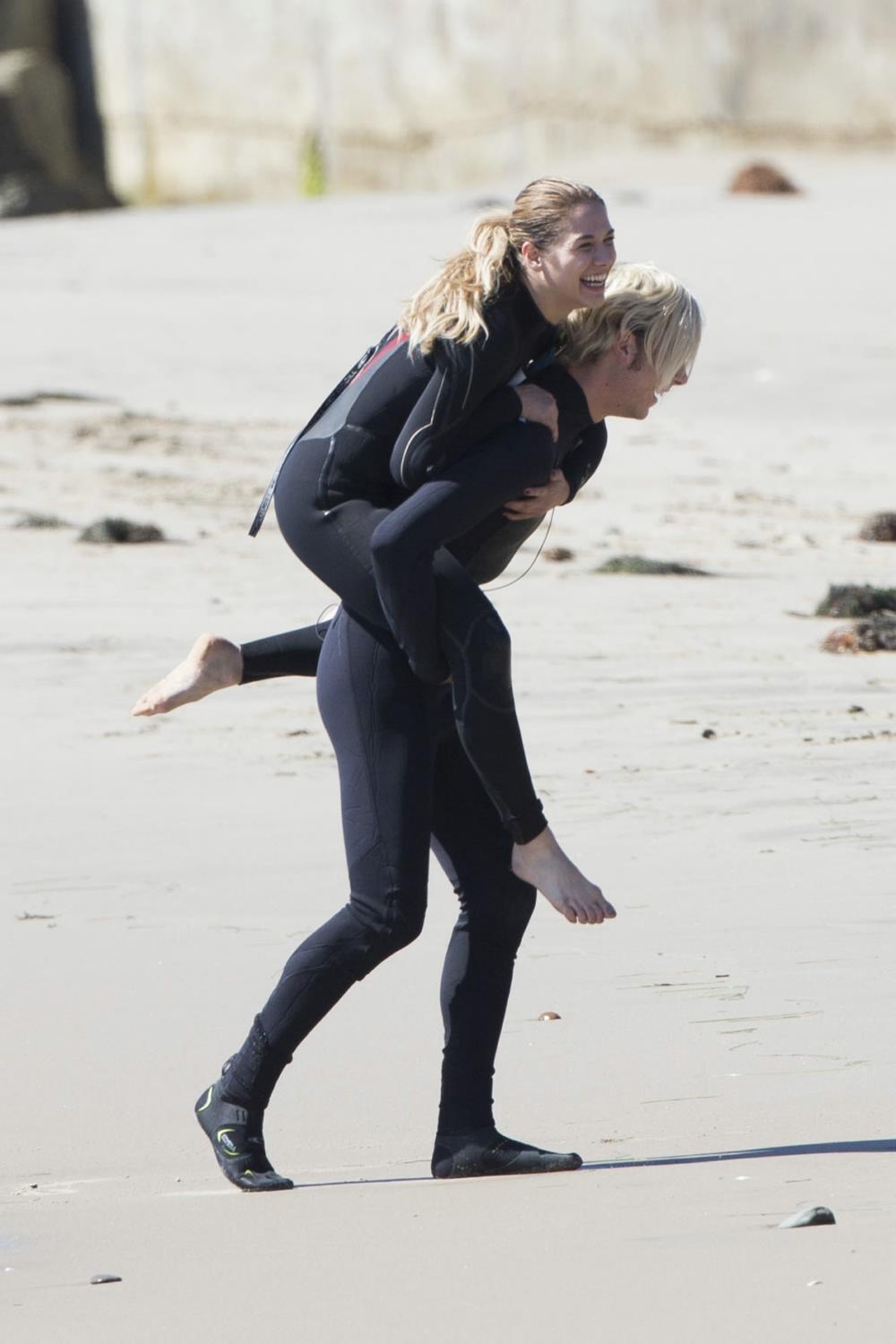 Riker Lynch Teaches Allison Holker To Surf-1