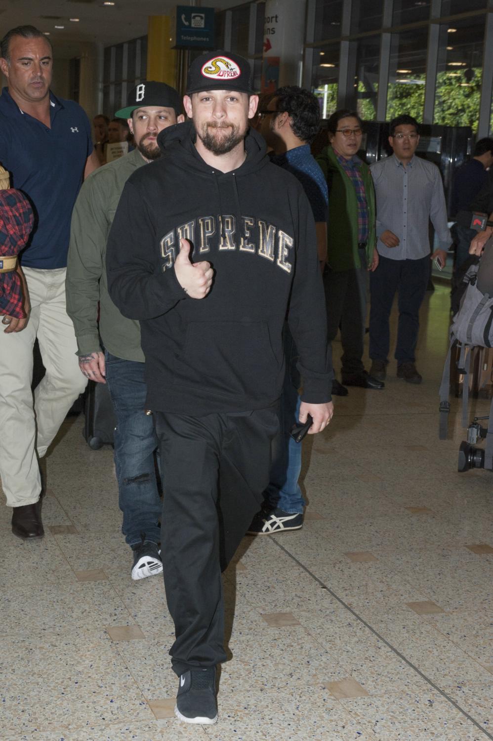 The Madden Brothers Arrive at LAX Airport
