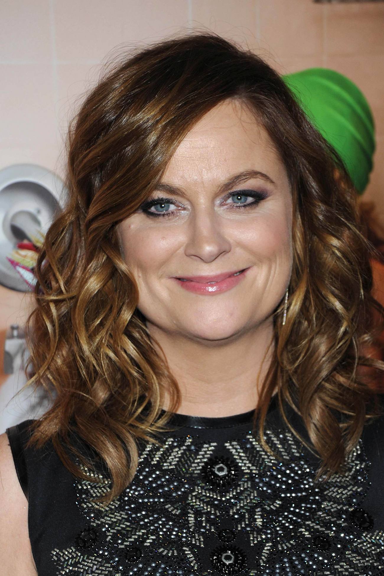 Tina Fey with Amy Poehler and a Rudolph arrive at The World Premiere of `Sisters`